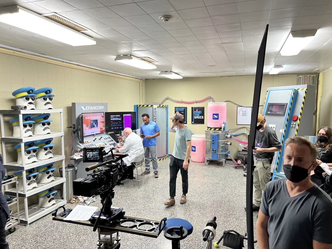 Behind the scenes photo 69 from Clone Cops production showing cast and crew preparing for a scene in the clone lab